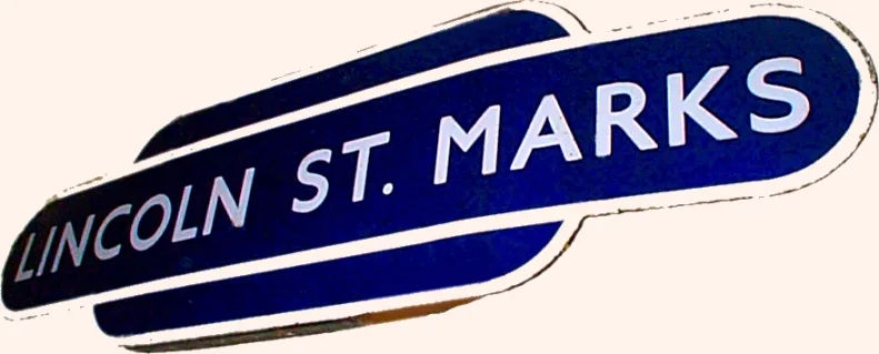 A dark blue British Railways Eastern Region totem sign reading Lincoln St Marks in white capitals